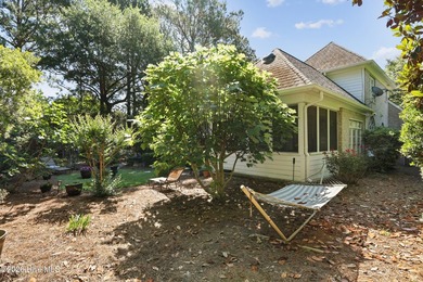 Set within the prestigious community of Landfall, this elegant - photo 50