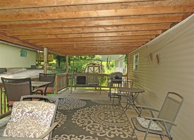 Step into a world of lakeside serenity with this stunning - photo 50