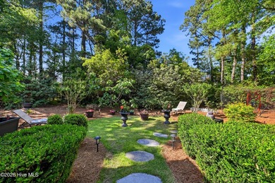 Set within the prestigious community of Landfall, this elegant - photo 52