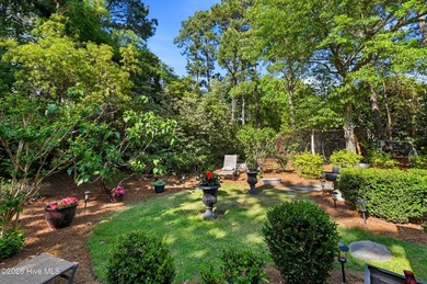 Set within the prestigious community of Landfall, this elegant - photo 53