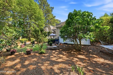 Set within the prestigious community of Landfall, this elegant - photo 54