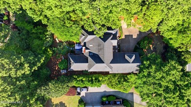Set within the prestigious community of Landfall, this elegant - photo 58