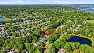 Set within the prestigious community of Landfall, this elegant - photo 59