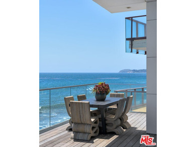 Set within the prestigious, guard-gated enclave of Malibu Cove - photo 12