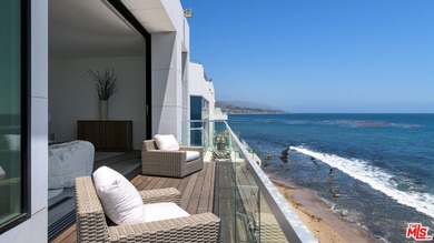 Set within the prestigious, guard-gated enclave of Malibu Cove - photo 17