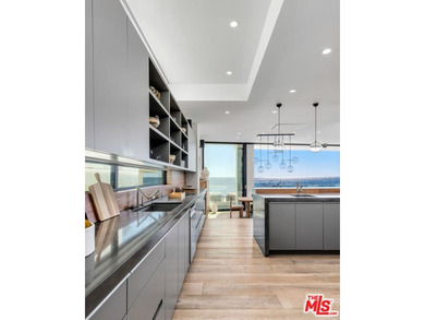 Set within the prestigious, guard-gated enclave of Malibu Cove - photo 20
