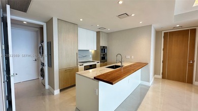 Welcome to the epitome of luxury living at the Ritz-Carlton - photo 4