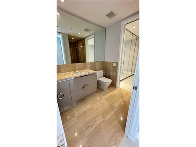 Welcome to the epitome of luxury living at the Ritz-Carlton - photo 10