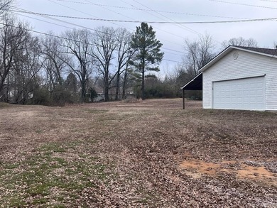 Adorable 2 bedroom, 2 bath home on 1 +/- acre.  Located at the