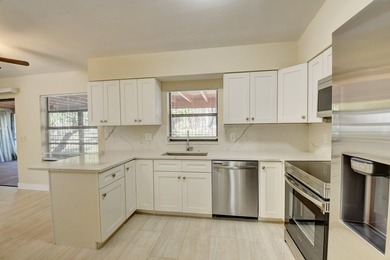 Discover this beautifully renovated 4-bedroom, 2-bathroom - photo 20