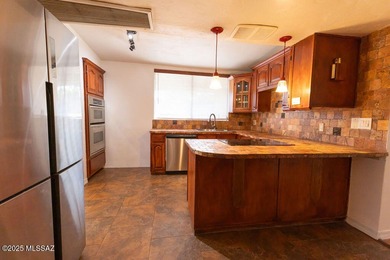 Experience refined living in this beautifully updated 4-bedroom