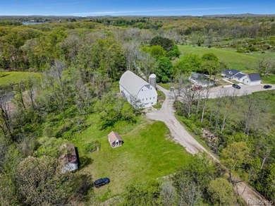 Build your dream home on the shores of prestigious Lake Angelus - photo 16