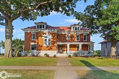 Impeccably restored 1902 Renaissance Revival riverfront estate