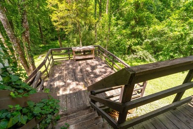 Tucked away on a peaceful one-acre wooded lot, this 4-bedroom, 3 - photo 12
