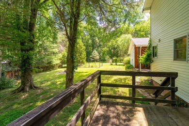 Tucked away on a peaceful one-acre wooded lot, this 4-bedroom, 3 - photo 13