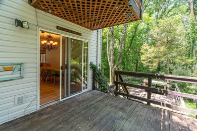 Tucked away on a peaceful one-acre wooded lot, this 4-bedroom, 3 - photo 14