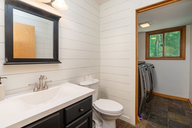 Tucked away on a peaceful one-acre wooded lot, this 4-bedroom, 3 - photo 15