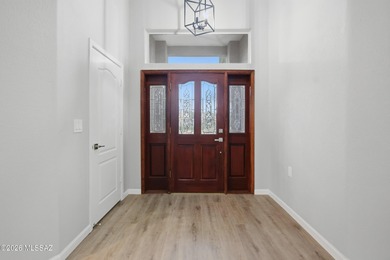 This better-than-new beauty nestled in the desired Country Club