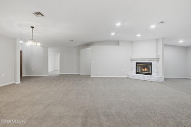 This better-than-new beauty nestled in the desired Country Club