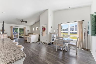 Situated in the Towns at Heather Glen community, this light and - photo 11