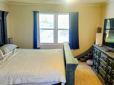 Take a look at this inviting 4-bedroom, 2-bathroom home tucked - photo 11