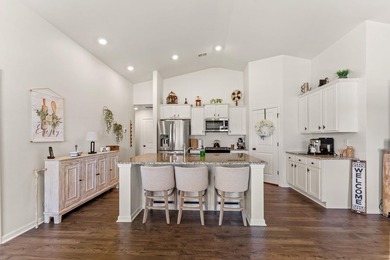 Situated in the Towns at Heather Glen community, this light and - photo 12
