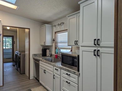 You must see this well-maintained home featuring a brand-new - photo 12