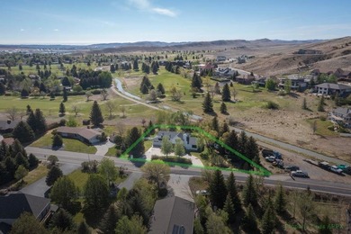 Nestled on a beautifully landscaped half-acre lot in one of - photo 2