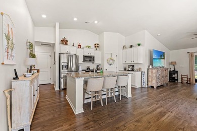 Situated in the Towns at Heather Glen community, this light and - photo 13