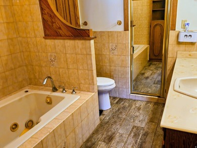 Take a look at this inviting 4-bedroom, 2-bathroom home tucked - photo 13