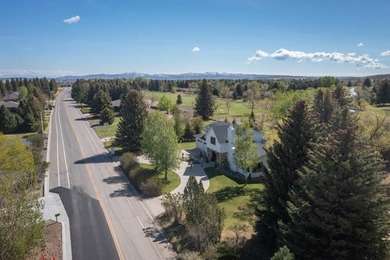 Nestled on a beautifully landscaped half-acre lot in one of - photo 4