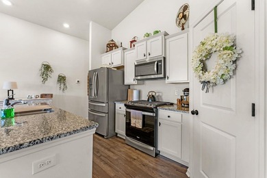 Situated in the Towns at Heather Glen community, this light and - photo 15
