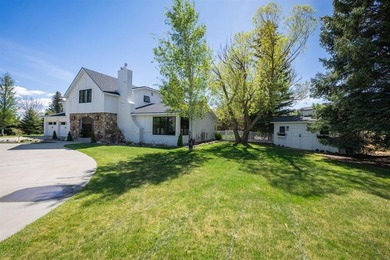 Nestled on a beautifully landscaped half-acre lot in one of - photo 7