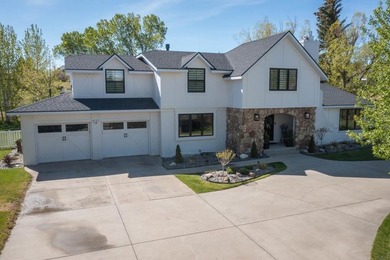 Nestled on a beautifully landscaped half-acre lot in one of - photo 8
