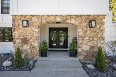 Nestled on a beautifully landscaped half-acre lot in one of - photo 9