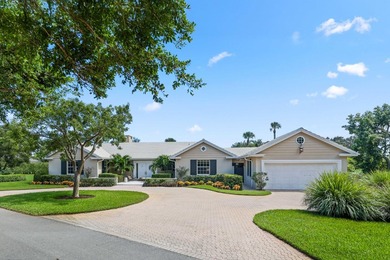 Set on a generous .88-acre lot overlooking the 8th tee, this - photo 1