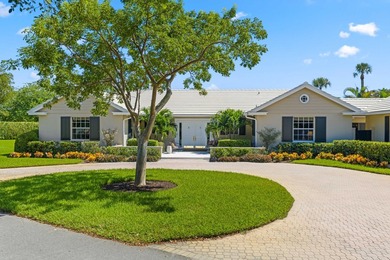 Set on a generous .88-acre lot overlooking the 8th tee, this - photo 2