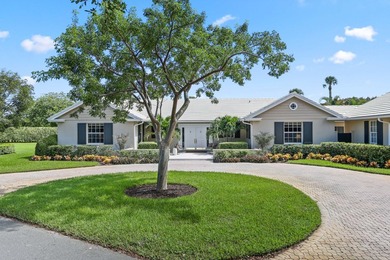 Set on a generous .88-acre lot overlooking the 8th tee, this - photo 3
