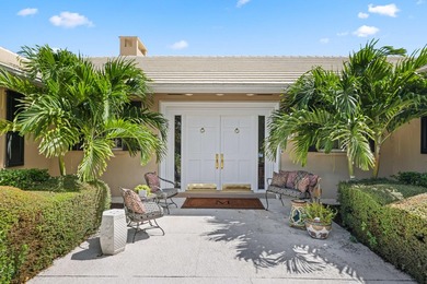 Set on a generous .88-acre lot overlooking the 8th tee, this - photo 4