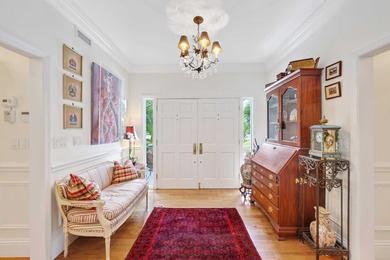 Set on a generous .88-acre lot overlooking the 8th tee, this - photo 5
