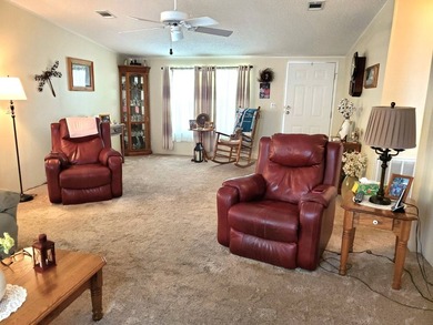 THIS HOME IS ON LEASED LAND WITH A MONTHLY LOT RENT OF $644 AND - photo 8