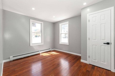 welcome to this fully brick semi detached two family corner home - photo 4