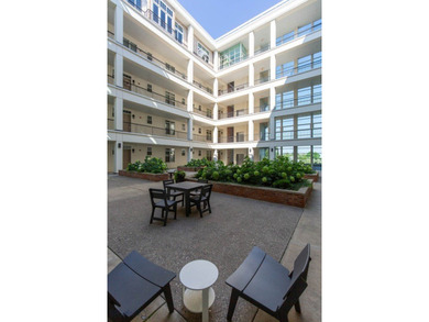 Perched on the fourth floor of Village Downtown, this - photo 28