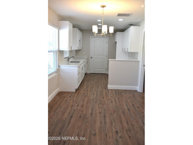 Looking to down size? This 2 bedroom with a separate office - photo 3