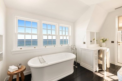 Nestled between the Atlantic Ocean and Georgica Pond lies a - photo 32