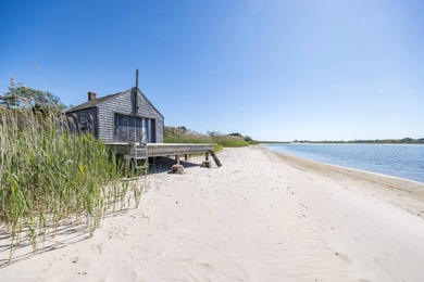 Nestled between the Atlantic Ocean and Georgica Pond lies a - photo 45