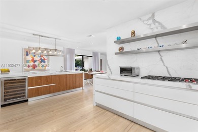 Nestled on one of Miami Beach's most exclusive streets, this - photo 8
