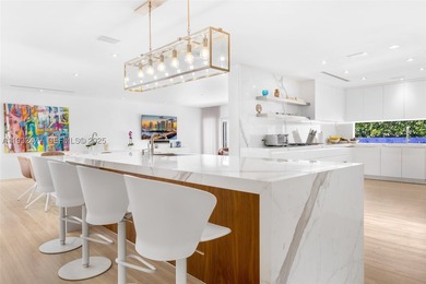 Nestled on one of Miami Beach's most exclusive streets, this - photo 10