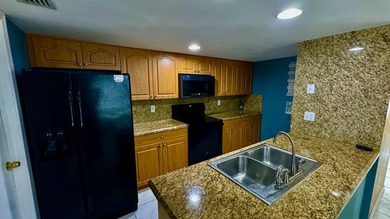 Located in the desirable gated community of Victoria Woods in - photo 2