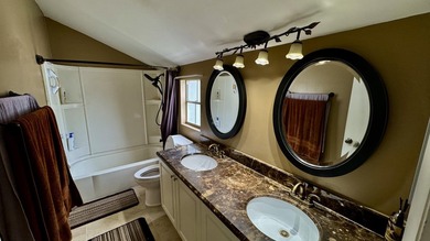 Located in the desirable gated community of Victoria Woods in - photo 7